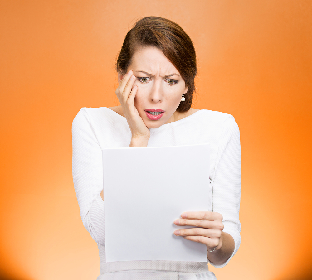 Frustrated woman with taxes